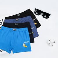 Three pairs of men's boxer briefs in blue, black, and navy on a white background with 'BANANA' branding.